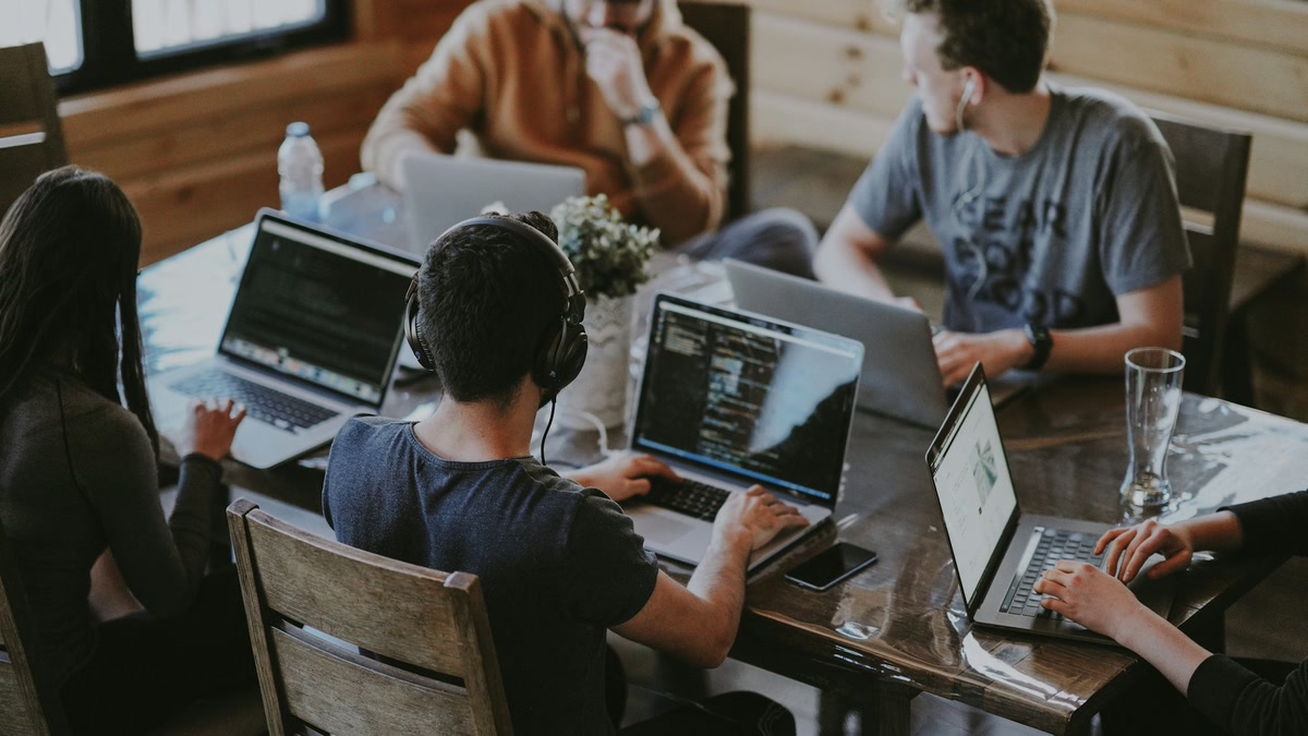 Office workers discussing how AI affects jobs in South Africa