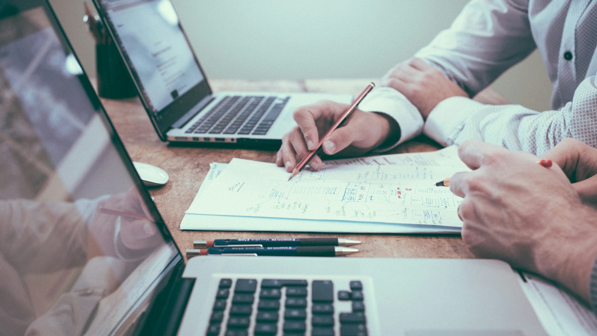 featured Freelancer comparing two AI model tiers for coding versus high-volume clerical work