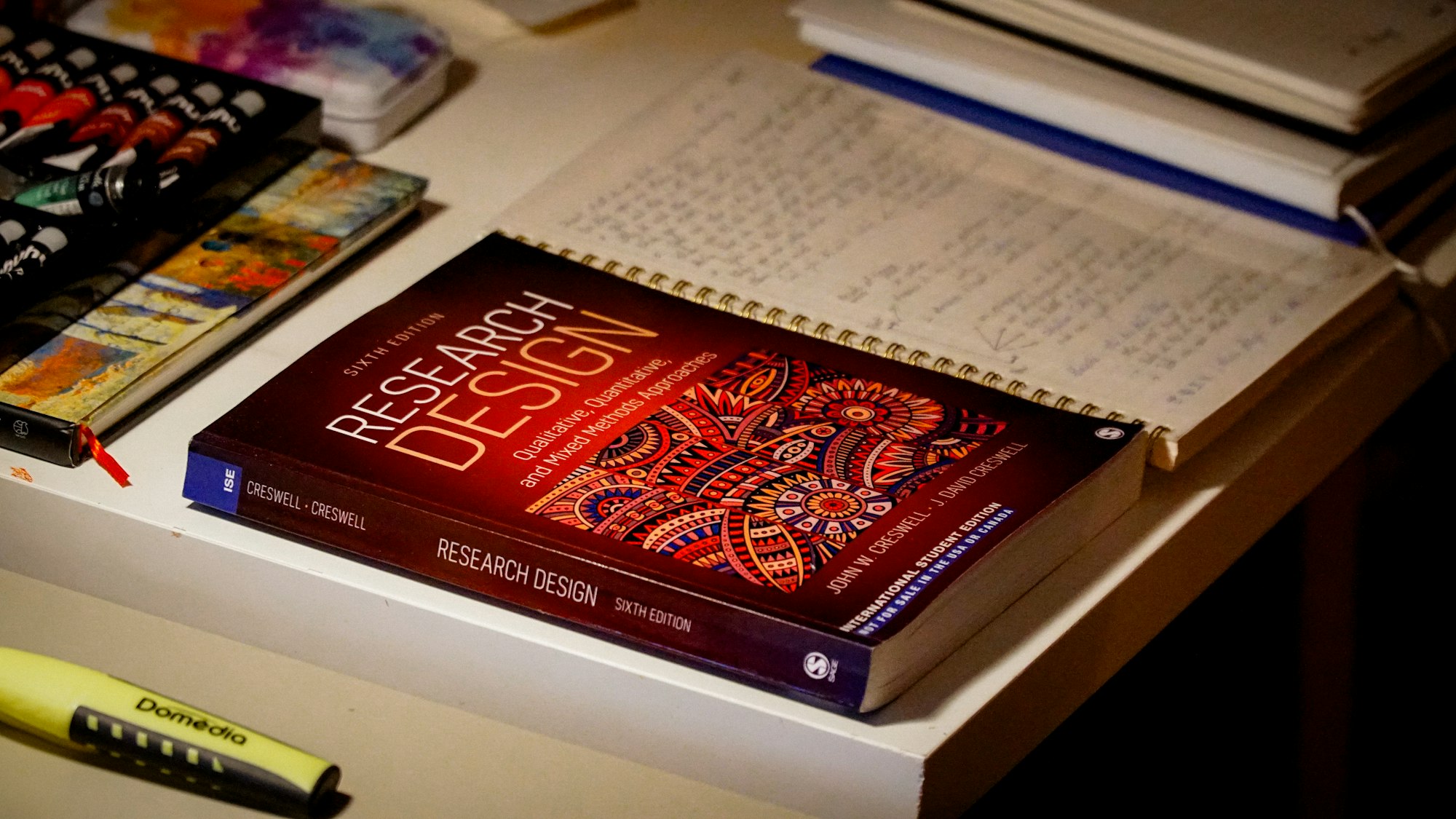 gemini-notebook-client-research-packs-featured Notebook with PDFs and research notes for a client pack