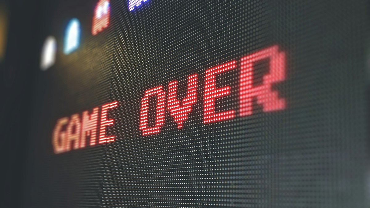 featured Pixel GAME OVER sign on a screen for a PS Plus October 2026 claim-before-November guide