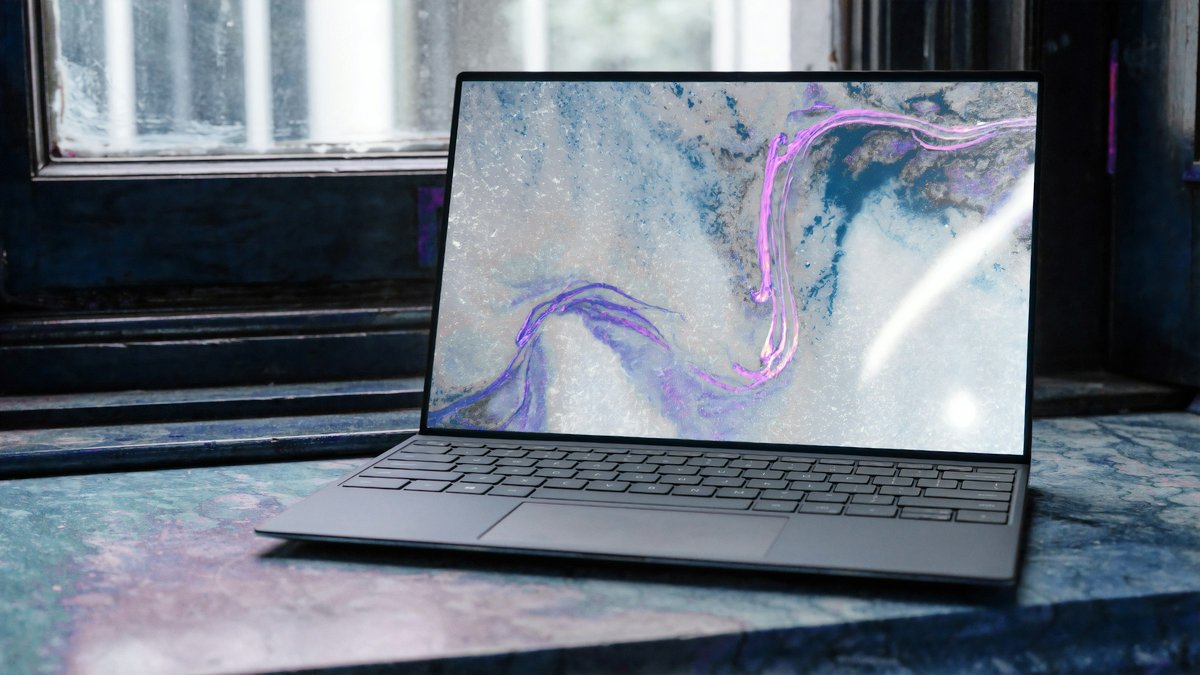 Silver laptop on a windowsill for a Surface Laptop Ultra buy, wait or skip decision
