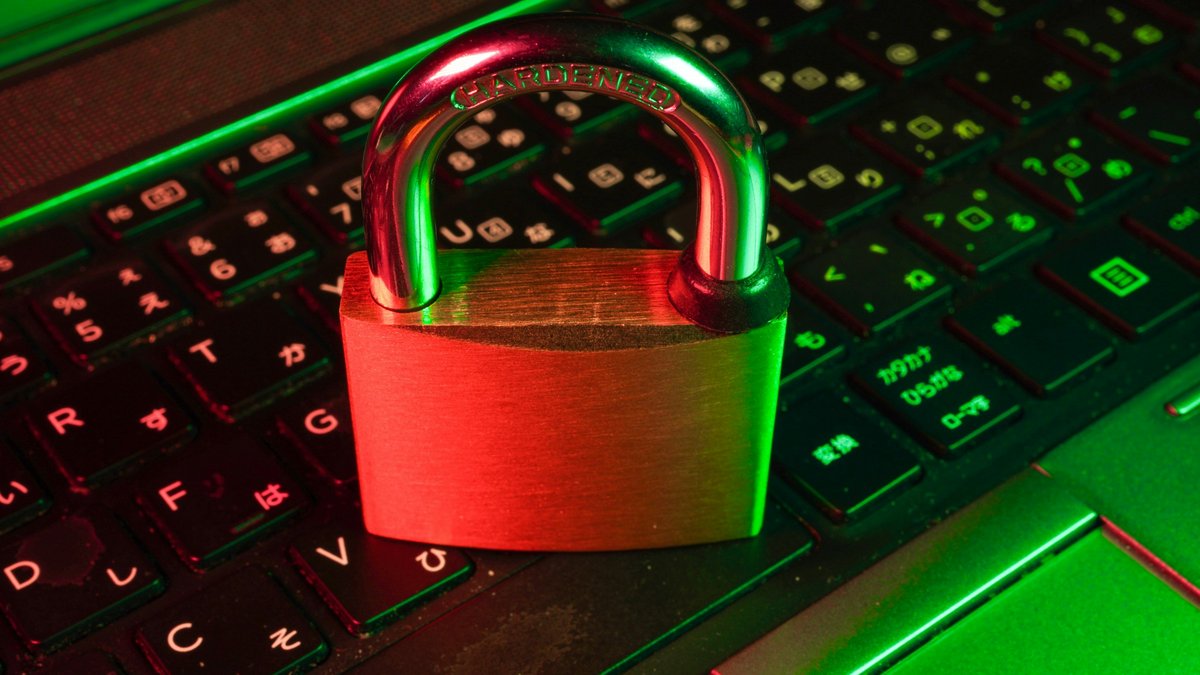 featured Padlock resting on a laptop keyboard, illustrating the Chrome 155 security update